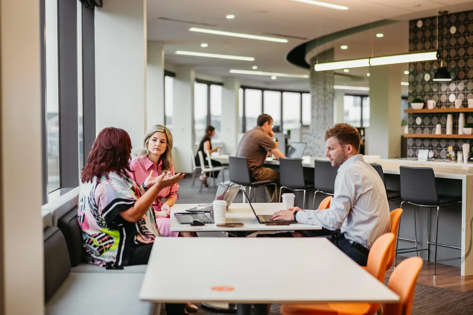 Managed Service Provider Image of two woman having a discussion at a table